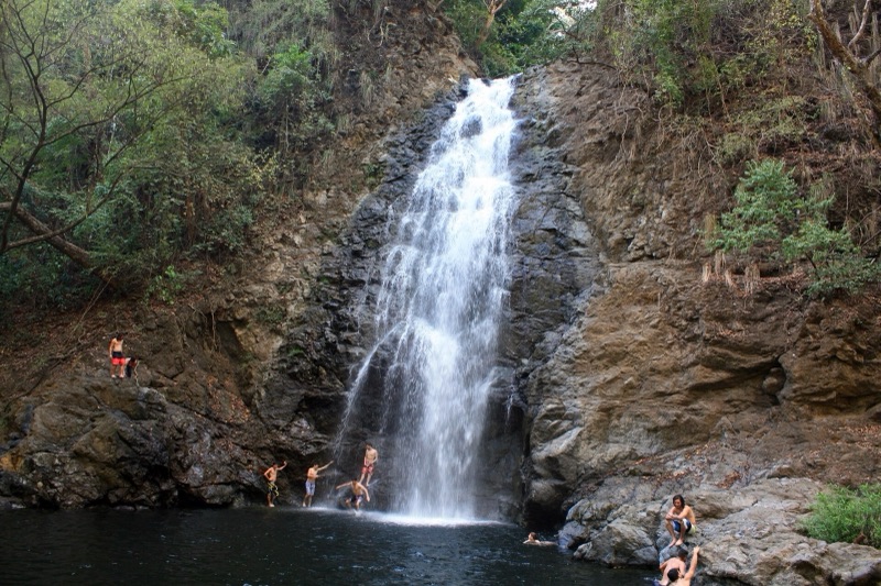 Swimmers at the pool below the lower Montezuma waterfall